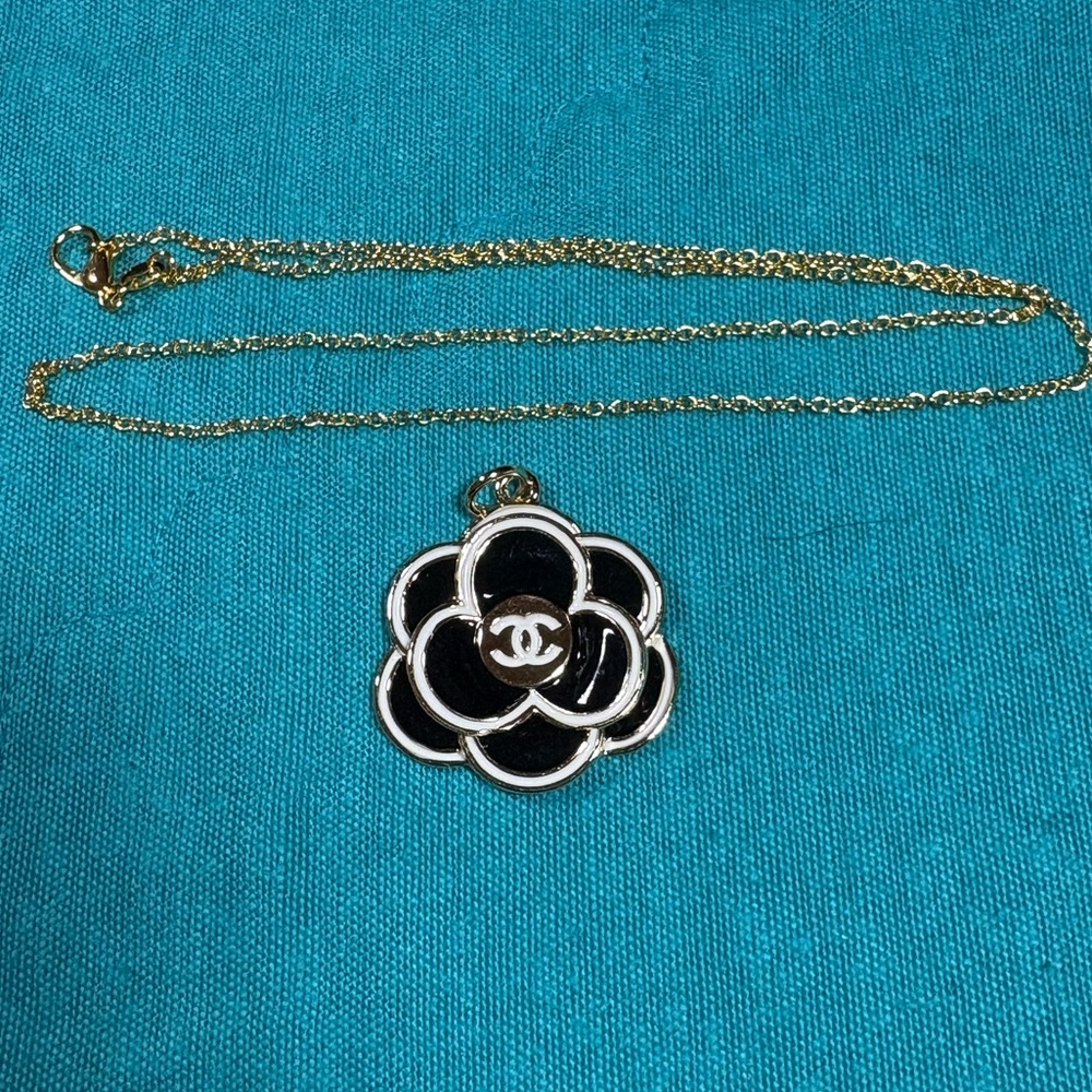 Camilla Flower Charm with gold tone necklace